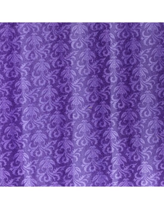 Tela con estampados pequeños en morado