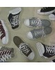 Tela estampada con botas converse